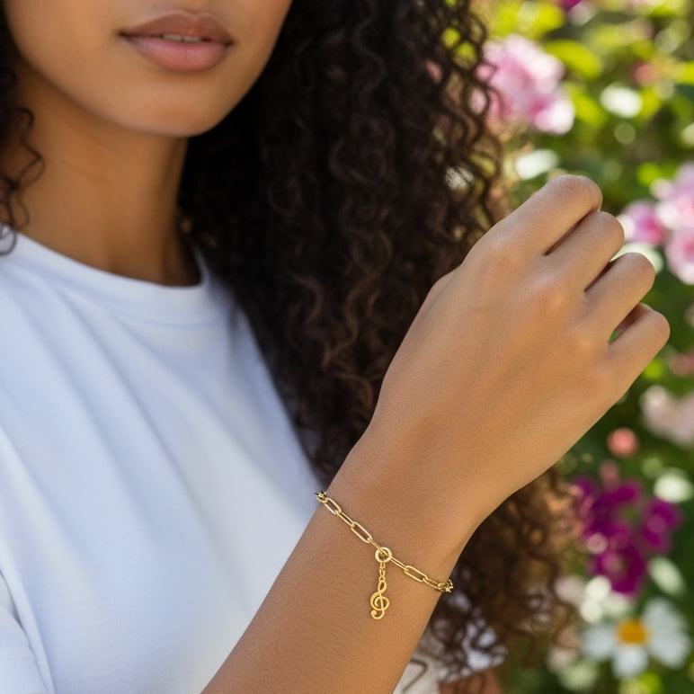 Kleiner Anhänger Violinschlüssel aus Edelstahl vergoldet