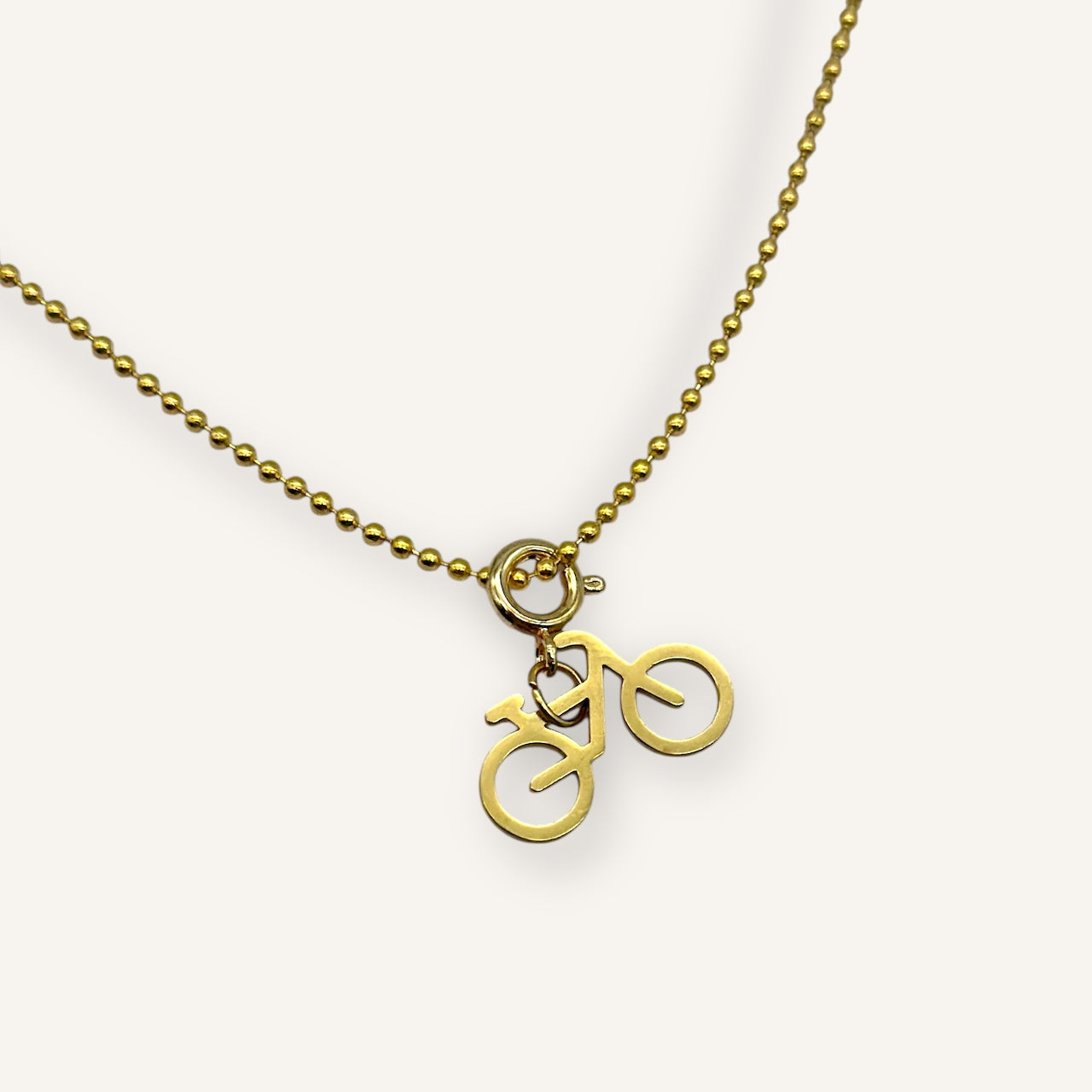 Kleiner Anhänger Fahrrad aus Edelstahl vergoldet